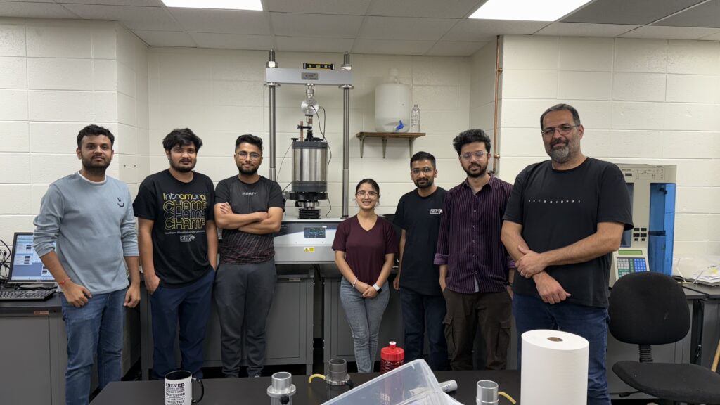 GeoCARE Lab team members in the geotechnical testing laboratory